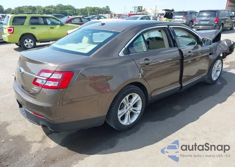 2015 Ford Taurus Sel z USA, uszkodzony, nr VIN 1FAHP2E81FG206636